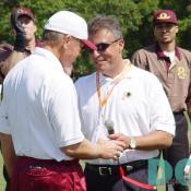 Larry Michael, the new voice of Redskins Radio, hands over the mic to Coach Gibbs.  Gibbs received a thunderous ovation from the faithful.