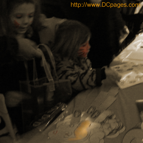 This little tigress and her sister enjoy their Disney halloween gifts. 