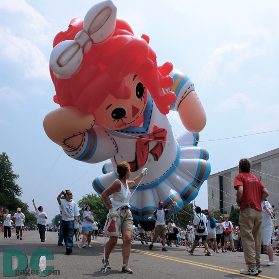 Raggedy Ann balloon. Raggedy Ann is a blue and white clad rag doll with red yarn for hair, created by writer Johnny Gruelle (1880-1938). 