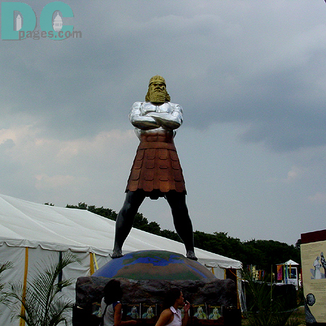 The statue of Colossus greets the guests that enter the festival grounds.