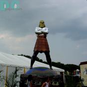 The statue of Colossus greets the guests that enter the festival grounds.