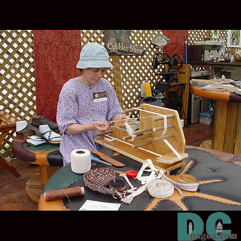 A beltmaker weaves elaborate and unique belts.
