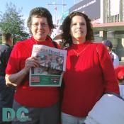 Washington Nationals' Inaugural Home Opener - Two Nationals fans display home team colors.