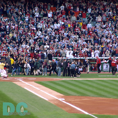 Washington Nationals' Inaugural Home Opener - President Bush waves to Washington National fans.