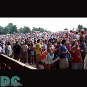 People on the lawn stand to get a better look as Howie Day begins to play.