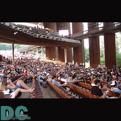 Some fans prefer to sit and relax during the show.