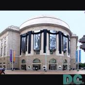 The Ronald Reagan Building and International Trade Center salutes Reagan with banners of his portraits and candid shots.