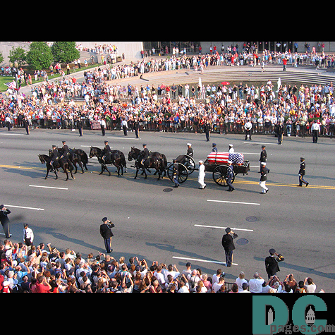 People take one last look at the casket that holds their former president.