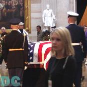 Ulysses S. Grant, the 18th President of the United States, stand (in statue form), during the proceedings.