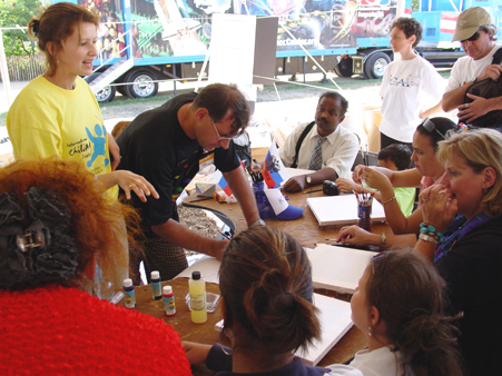 Art educator Sergey Gagauzov (Russia) teaches festival participants silk painting, September 11, 2003