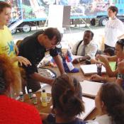 Art educator Sergey Gagauzov (Russia) teaches festival participants silk painting, September 11, 2003