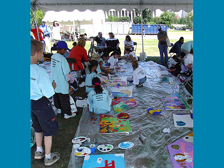 Young Artists work on Art for Peace Pyramid panels