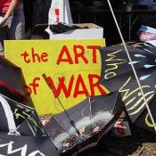 Peace parasols painted in Public Assemblys arts and crafts activity, September 11, 2003