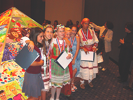 Young Artists in front of Art for Peace Pyramid
