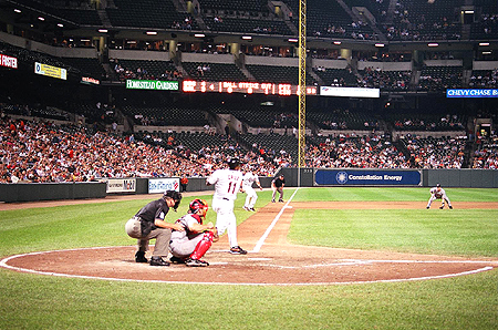 Deivi Cruz tries to bring home a run for the Birds.