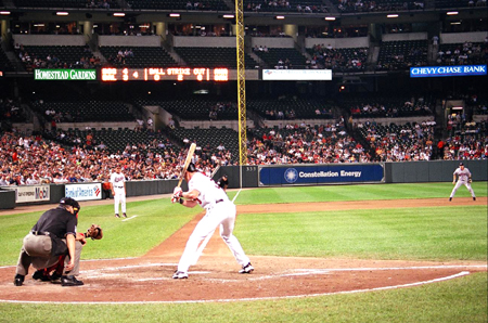 The Orioles finally flattened the playoff-charging Red Sox with a four-run eighth, helped by two costly Boston errors. 