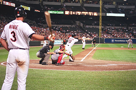 Baltimore Oriole Larry Bigbie warms-up before taking his tun at the plate.