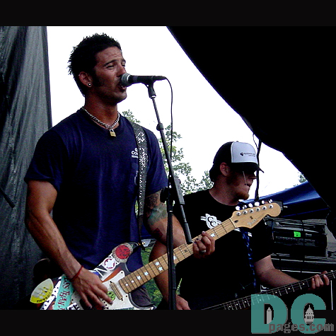 The lead singer of the ERKS plays to the crowd gathered in front of the Teal Stage.