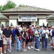 Crowds check out all the merchandise at the onsite golf shop