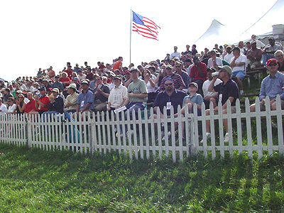 Enjoying the beautiful day, this crowd choose their seat on the hill