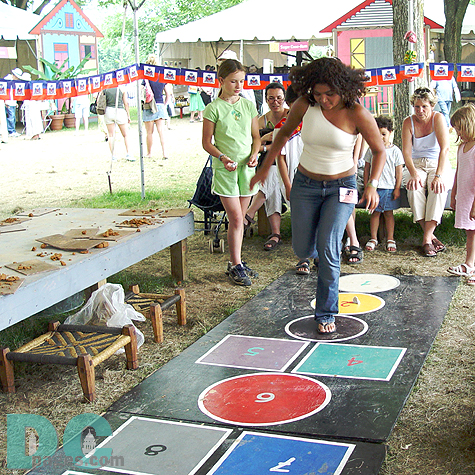 These girls are playing the Haitian version of "hopskotch."