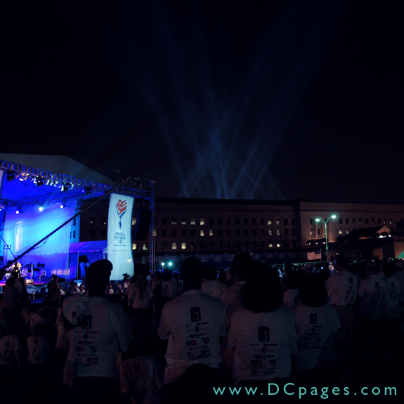 Participants of the 2006 Washington, D.C. Freedom Walk watch as 184 beams of light are illuminated at the Pentagon during the Washington, D.C., Freedom Walk, Sept. 10, 2006.