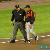 Baltimore Orioles Manager Sam Perlozzo has a quick chat with the umpire.