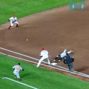 The Baltimore Orioles slide in safely to third base.