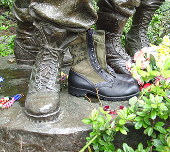 A real foot soldiers jungle boot was left with writing from a fellow soldier who survived the war.