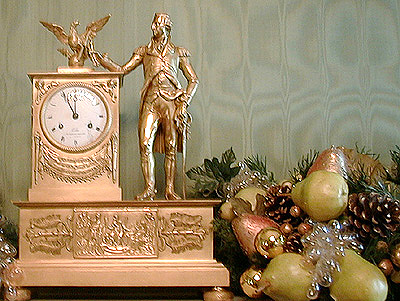 This is another example of the beautiful ornaments the cover the White House during the holidays. Many of the mantels are also covered with gold and green ornaments, along with red poinsettas.