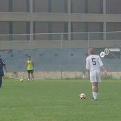 Many fouls were committed by both college teams during the game. Here, Georgetown's Jeff Curtin prepares to take his free kick.