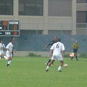 Dan Pydo, a Sophomore defender for the HOyas, tries to stop a Howard forward from scoring.