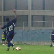 Kwesi Graham, a senior midfielder from Howard University, dribbles the ball down the field.