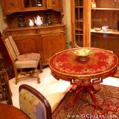 Chelsea and Co. Antiques - Wow! A red Japanned center or dining table surrounded by larger and smaller European furniture 
