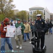 These Demonstrators enjoyed a chat with a DC Police Officer riding on his Segway during the April 16,2007 march on Capitol Hill to demand Congressional Voting Rights for DC residents.