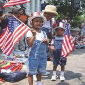 Children displaying their patriotic colors
