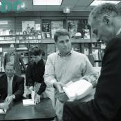 Mr. Nader passes, his purchased book, 'An Inconvenient Truth,' to be signed. 