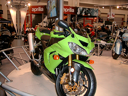 This mean green machine is Kawasaki's ZX10R. The R most definitely stands for racing.