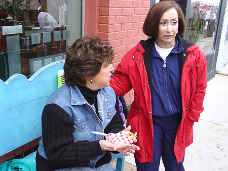 Rockville native Judi Greenberg chats with her friend Wendy while enjoying some of Bethesda's fine food.