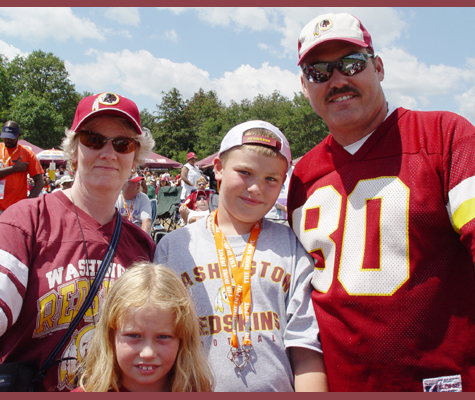 Mike Pleffner (right) and family traveled from Annapolis to see the return of Coach Gibbs.