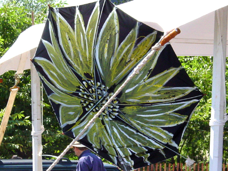 Peace parasols painted in Public Assemblys arts and crafts activity, September 11, 2003