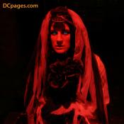 Dark angel with blue eyes.