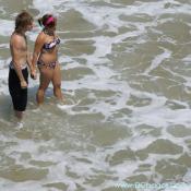 Ocean City - This couple is almost washed away as they search for seashells along the coast.