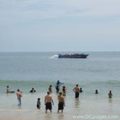 Ocean City - This group stops for a moment to look at the Sea Rocket cruising by.