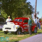 The Nostalgic Gasser 1940 Ford Truck. The bite looks intimidatating, but the bark was so loud this machine screamed STAND BACK! Notice the street tag.