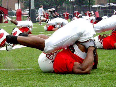 Before practice begins, the entire team does calisthenics.