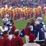 The Cowboys realize that as soon as they enter FEDEX they are not liked. In this photo the 65 years old Washington Redskins Marching Band blast the Cowboys with our fight song.