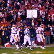 The fans cheer the Redskins running into their locker room after a great halftime performance.