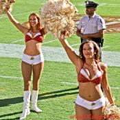 Beautiful Redskin cheerleaders pump up the crowd.