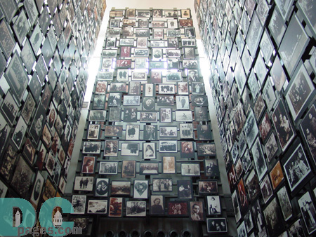 Called the "Tower of Faces" this room has four sides with many different pictures of people.